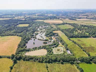 An aerial view of fields and lakes at Willow in Dolton