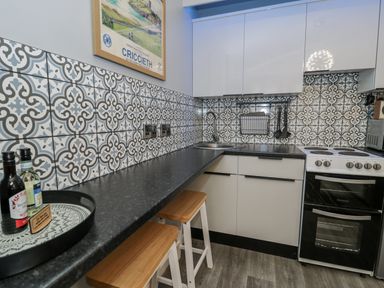 A kitchen with counter space and appliances at Estuary Escape in Porthmadog