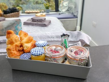 A breakfast tray with croissants jars of preserves and yogurt in a kitchen at Sunriser in Tara Hill near Ballymoney County Wexford