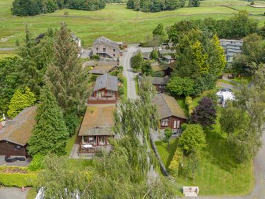 An aerial view of cabins and greenery at Lodge 7 At Pound Farm Crook near Kendal