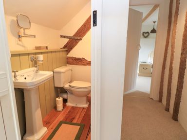 A bathroom with a sink and toilet at 8 Gloucester Street Winchcombe