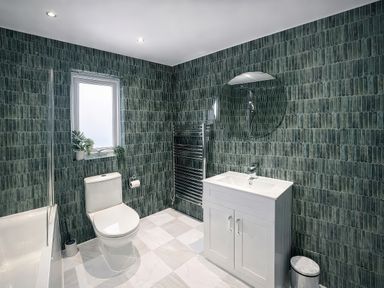 A bathroom with a sink and a shower in Bay View, Portreath