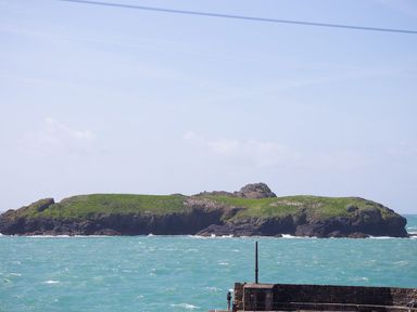 An island surrounded by water at Rowena in Mullion
