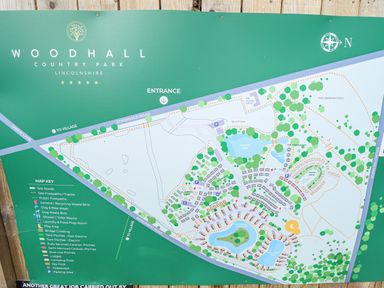 A map of Woodhall Country Park showing roads footpaths lakes and various pitches in Lincolnshire