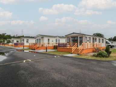 Static caravans in an outdoor area at Aspen in Denny