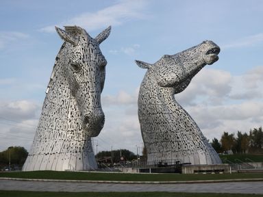 Two large horse sculptures in a park at Ash Denny