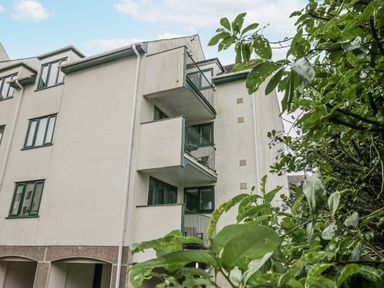 A building with balconies and windows at Claife Flights in Bowness-On-Windermere