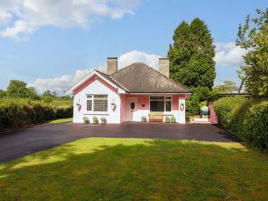 A house with a driveway and garden at Rosemont in Adare