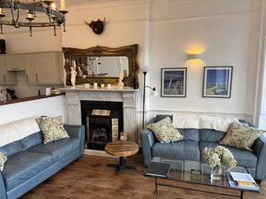 A living room with two sofas and a coffee table at Bayview Tower in Lynton