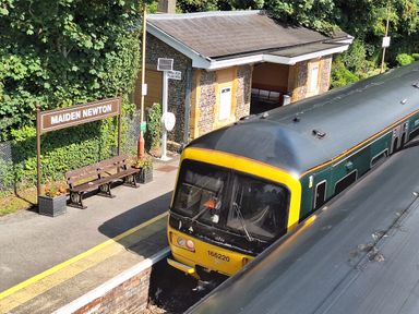 A train at Maiden Newton station in Maiden Newton