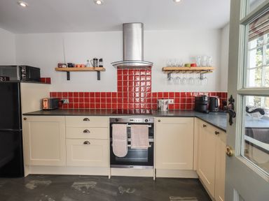 A kitchen with appliances and countertop at Daffodils in Ambleside