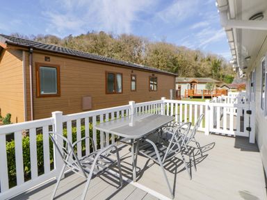 An outdoor area with a table and chairs at Erisa in Stepaside