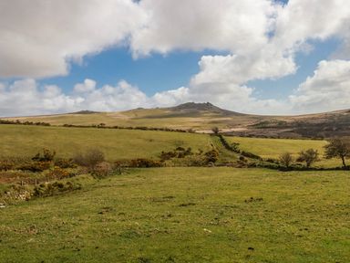 A landscape with hills and fields at Roughtor Barn Poldue near Camelford