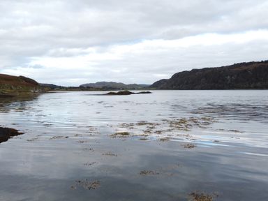 A body of water with hills in the background at Scarba, Balvicar, Isle Of Seil