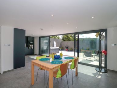 A dining room with a table and chairs at Number 7 in Bishop Sutton