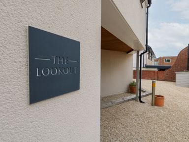 The entrance area with a sign at The Lookout in Wyke Regis