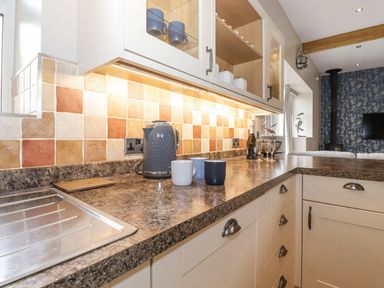 A kitchen with countertop and kitchenware at The Gatehouse