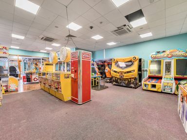 An arcade with various game machines and a ticket station at Billy’s Way - Hayling Island