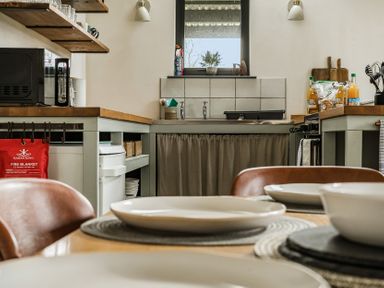 A kitchen with sink and stove at Grove Cottage in Kington