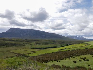 A landscape featuring mountains and fields at Shane's Cottage in Falcarragh, County Donegal