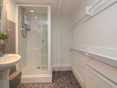 A bathroom with a shower and sink at 43 The Salcombe in Salcombe