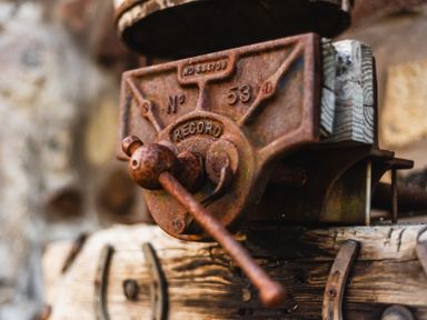A close-up of a rusty record player on a wooden surface at Cheviot Manor in Akeld near Wooler