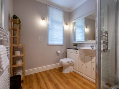 A bathroom with a sink and shower at Marina View in Bowness-On-Windermere