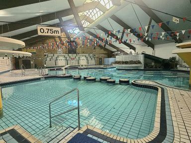 A swimming pool area with a slide at Valley Lodge 38, St Ann's Chapel, Cornwall