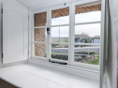 A window with an outdoor view at Westacombe Farm in Dunsford near Tedburn St Mary