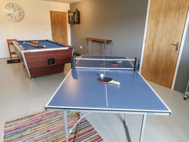 A game room with a ping pong table and a pool table at Stapleford Farm in Hooke near Beaminster