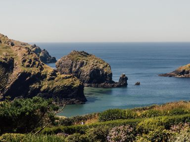 A scenic view of cliffs and ocean at Trevean in Mullion
