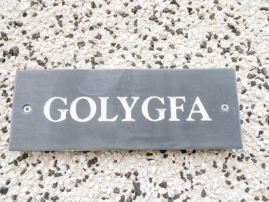 A name plaque displaying Golygfa at Golygfa, Pandy Tudur near Llanrwst