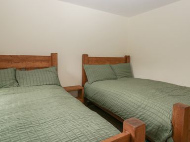 A bedroom with two beds in Howgill Head Kendal
