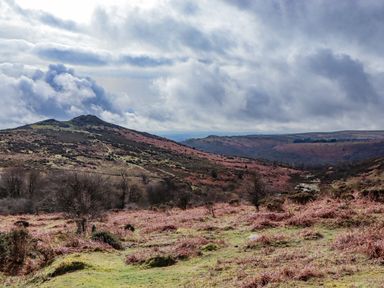 A landscape with hills and clouds at Harcombe House Rooms - First Floor King, Chudleigh