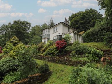 A house with surrounding garden at High Cross in Keswick