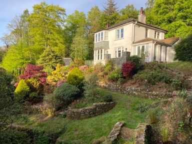 A house with a garden and pathway at High Cross in Keswick