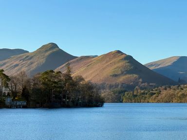 A landscape view of mountains and a lake at High Cross in Keswick