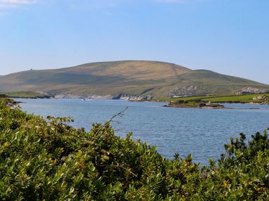 View of a river and mountain landscape at O'Conells Portmagee