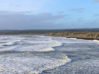 A view of the ocean with waves and shoreline at Teach Ti Miltown Malbay