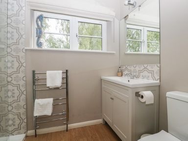 A bathroom with a sink and toilet at St. Marys House, Church Westcote near Bledington