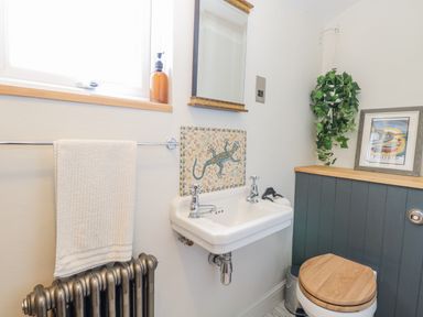 A bathroom with a sink and toilet at 18 Pakefield Road in Lowestoft