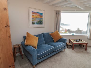 A living room with a sofa and coffee table at Iveridge in Sandsend