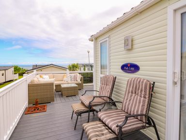 An outdoor terrace with seating at Park Lane in New Quay