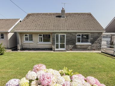 A house with a lawn at No.1 Vanderhoof Way in Saundersfoot