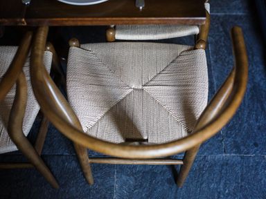 A chair with woven seat at Grove House in Grange-Over-Sands