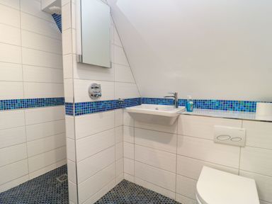 A bathroom with a sink and toilet at Silver Copse Frilford Heath Near Abingdon