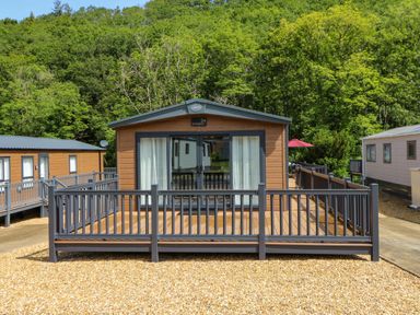 A holiday home with decking and sliding doors at The Beaumont No 34 in New Quay