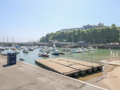 A harbor scene with boats in water at No 13 Broadfield Farm Holiday Park Saundersfoot
