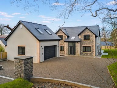 A house with garage and driveway at Ty Landsker in Milford Haven