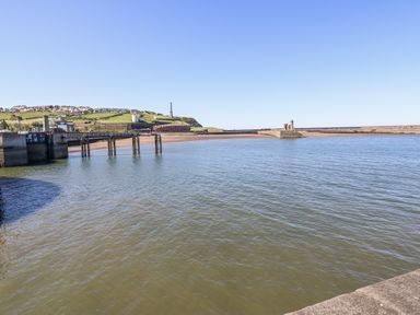 A view of a pier and water at Keekle Terrace in Cleator Moor